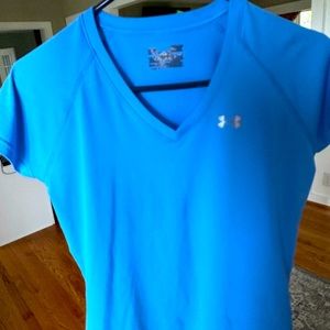 Under armor light blue. Love but can’t wear anymore. Cool breathing material